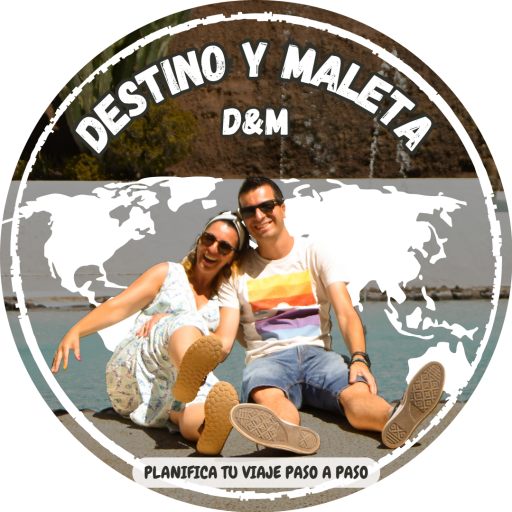 logo destino y maleta circular