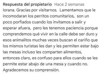 Reseña de Google: respuesta del propietario a una opinión de Makona Restaurant sobre los perros callejeros que dejan entrar al local