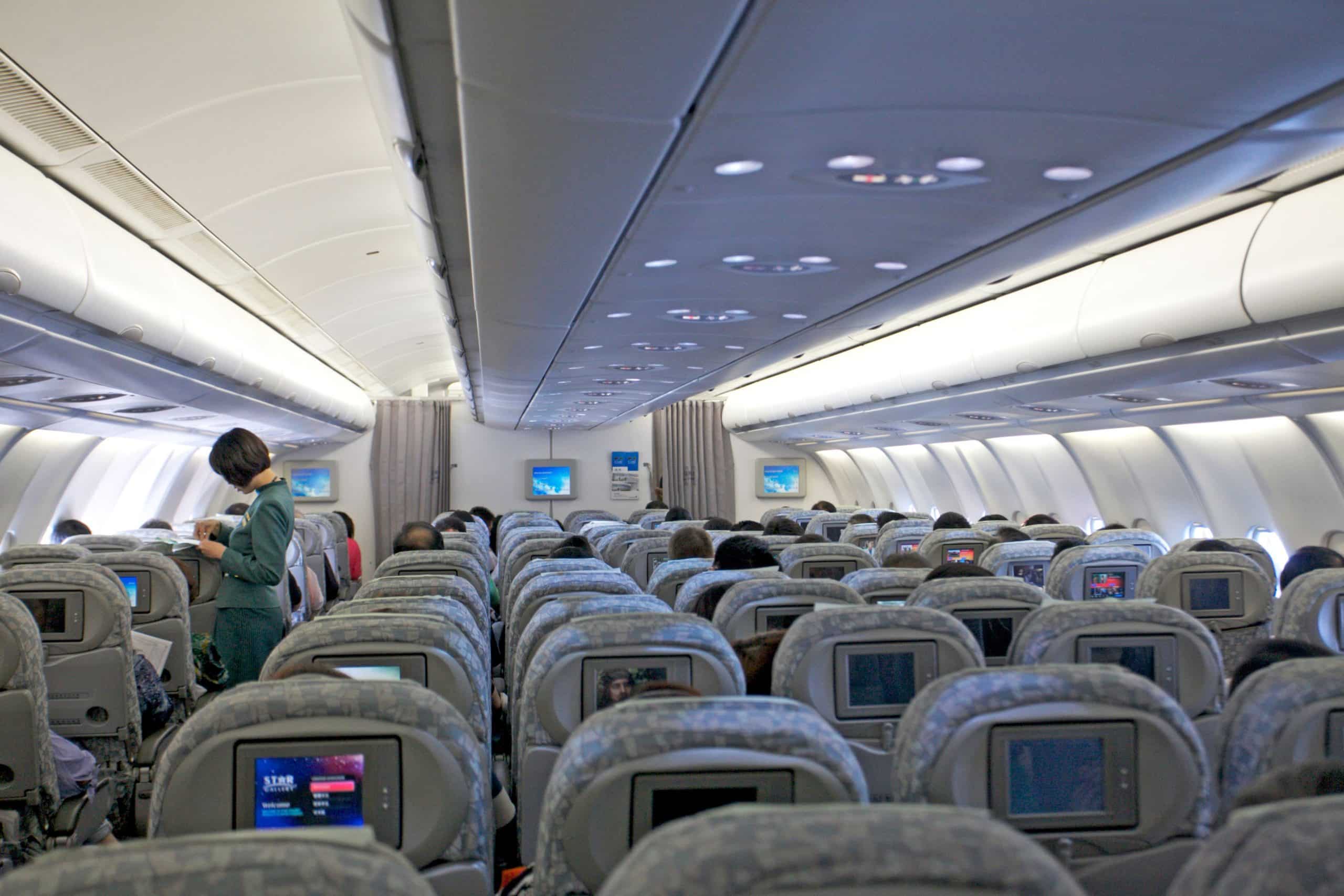 cartel salida de emergencia avión